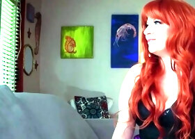 A redheaded stepmom in ebony lace relieves at home