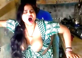 Desi Bhabhi Big Boobs Cleavage Tease in Kitchen Hot Indian Village Girls Exposed Hindi Video